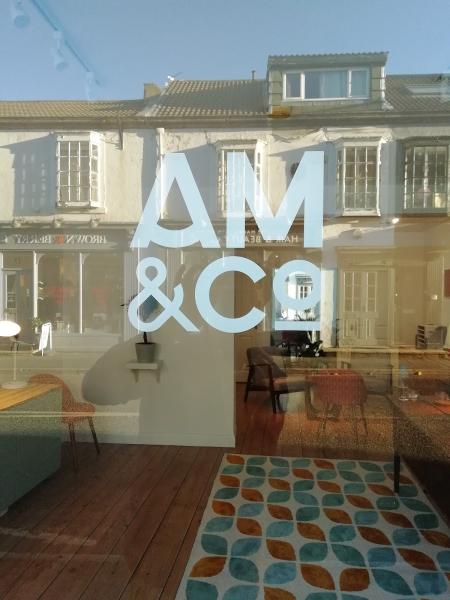 AM & Co